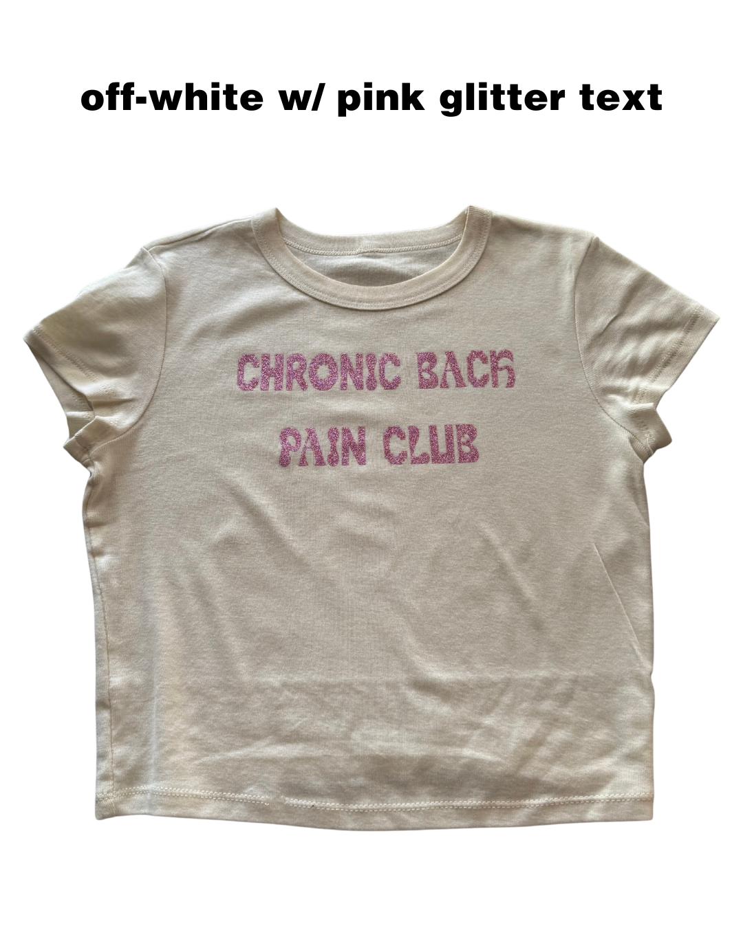 off-white t-shirt with pink glitter text 'CHRONIC BACK PAIN CLUB' on a white background