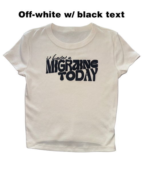 off-white t-shirt with black text 'I have a MIGRAINE TODAY' on a white background