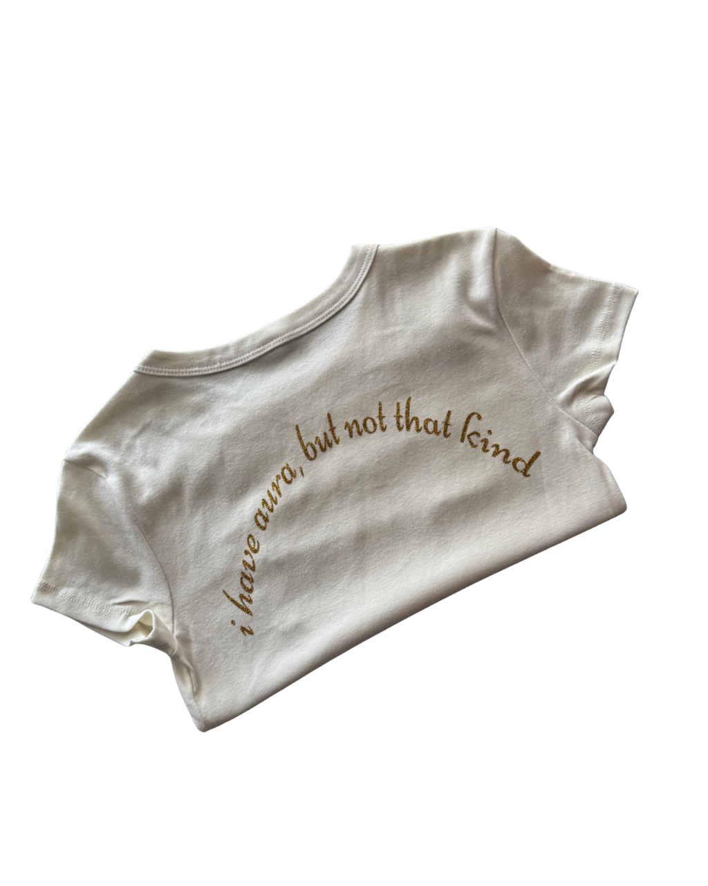 off-white folded crop top with text "i have aura but not that kind" on a white background