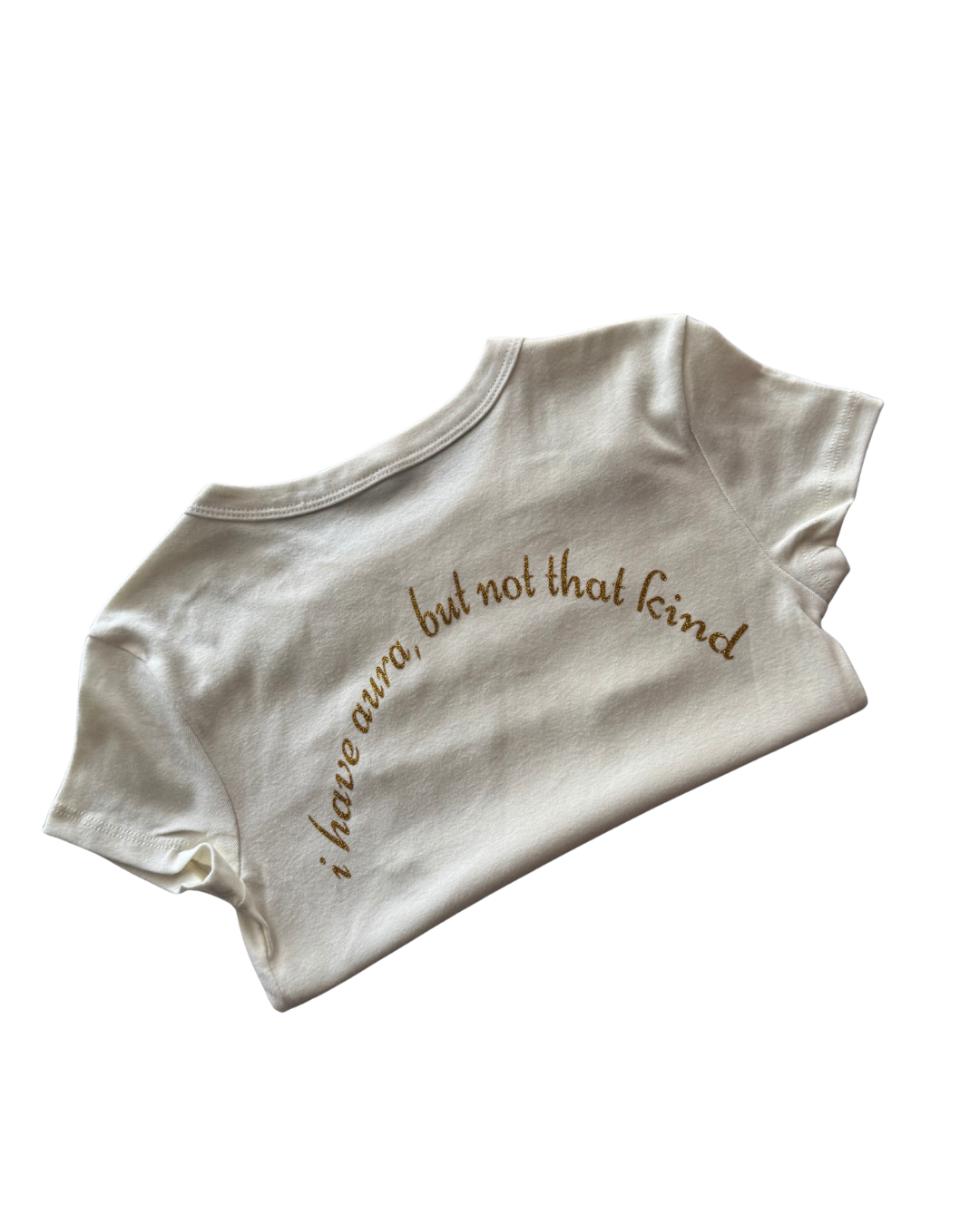 off-white folded crop top with text "i have aura but not that kind" on a white background