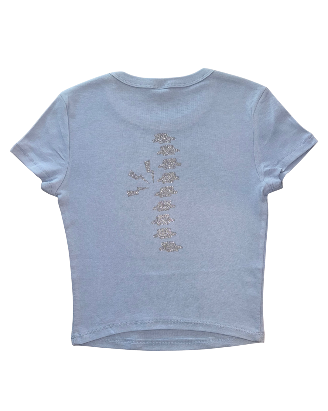Light blue t-shirt with a silver glitter spine on a white background
