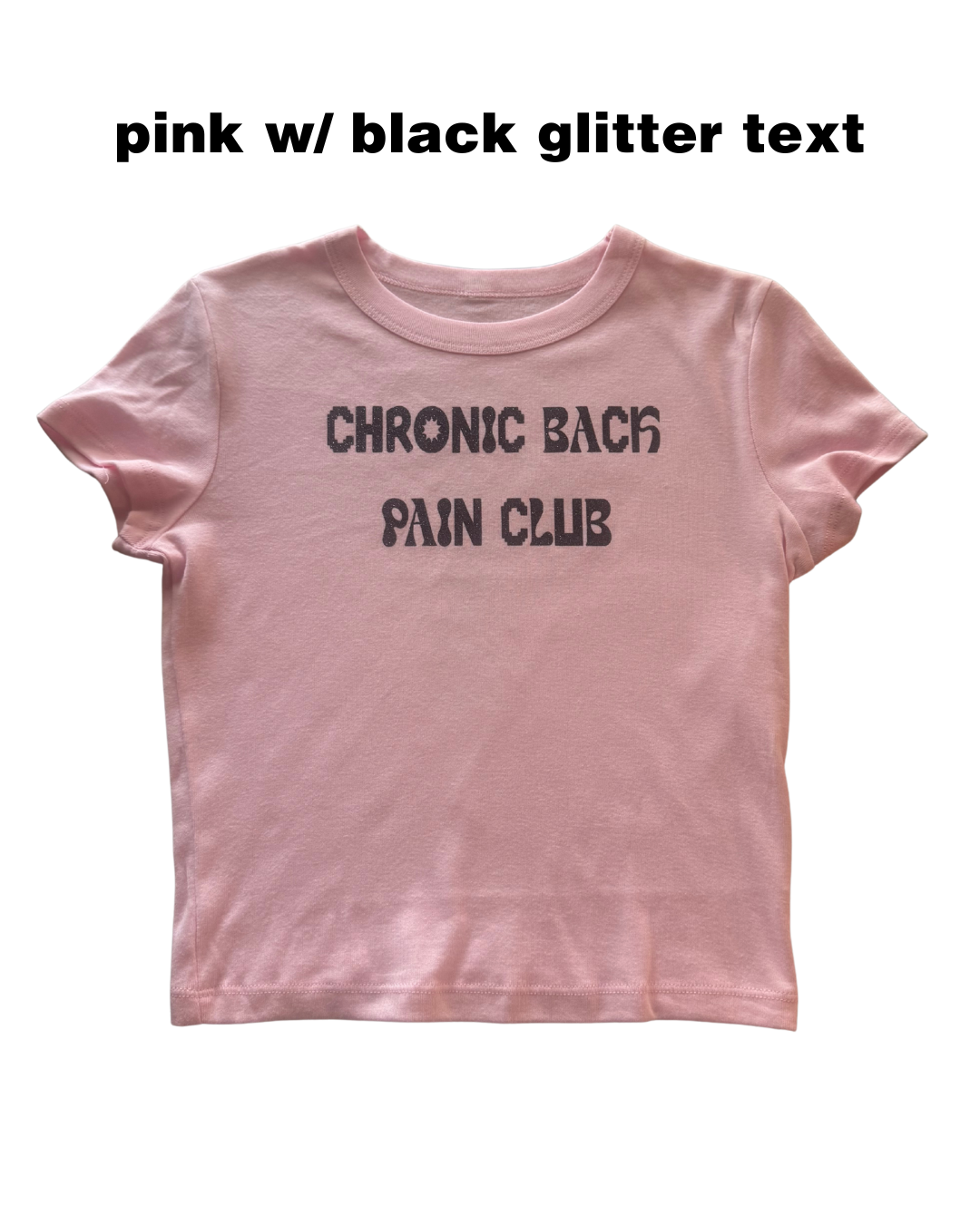 Pink t-shirt with 'Chronic Back Pain Club' black glitter text on a white background