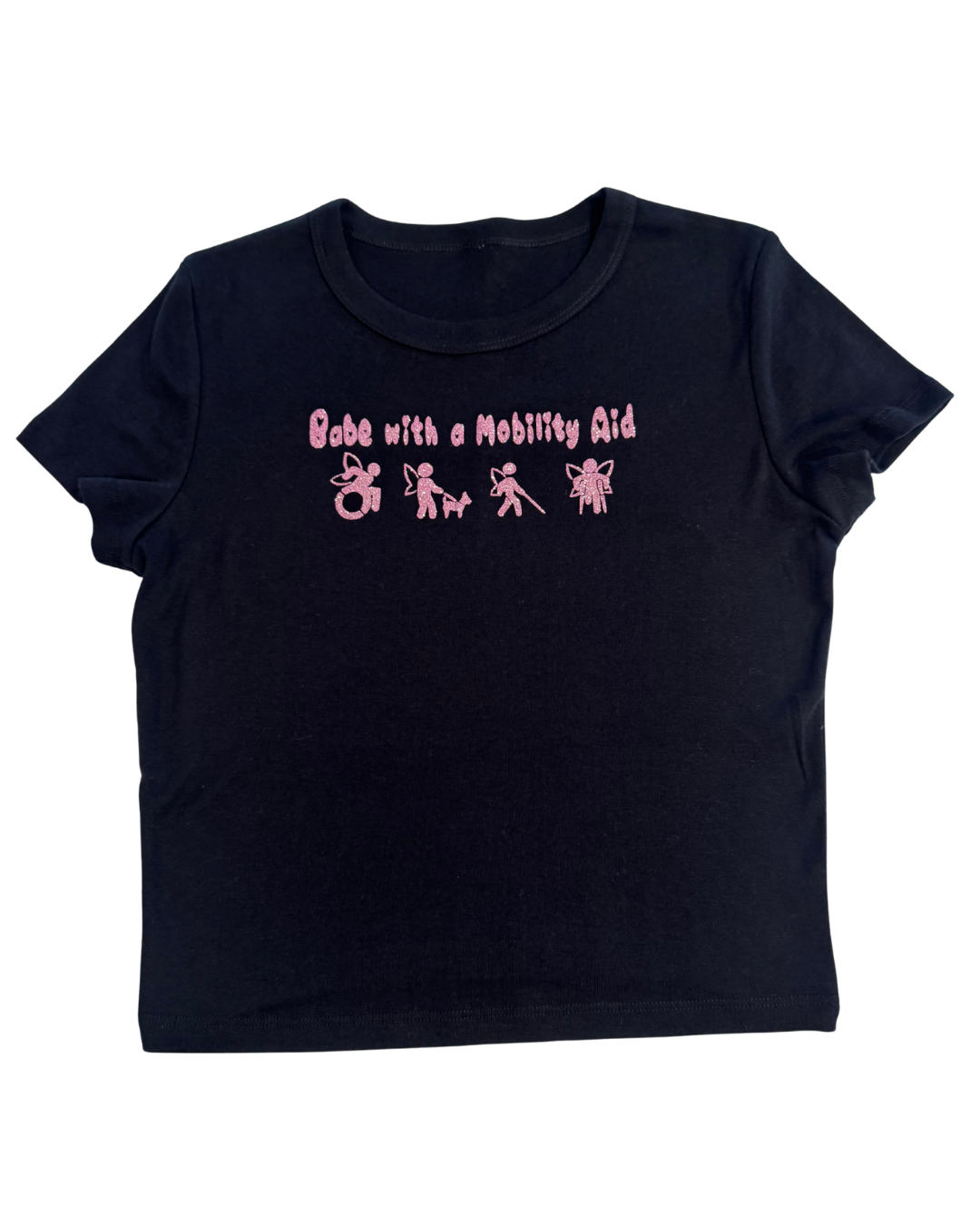 Black t-shirt with pink glitter text that says "Babe with a mobility aid" in bubble letter typography and disability symbols on a white background