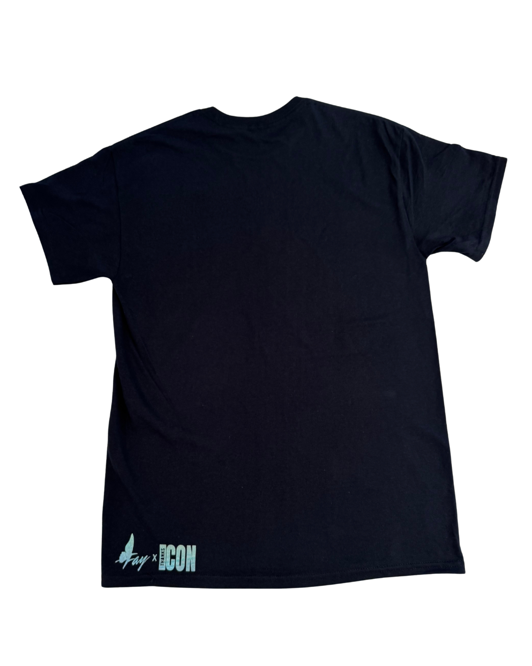 Back of black t-shirt with text on the back against a white background. The bottom left corner has the Fay x Thanks Icon logos.
