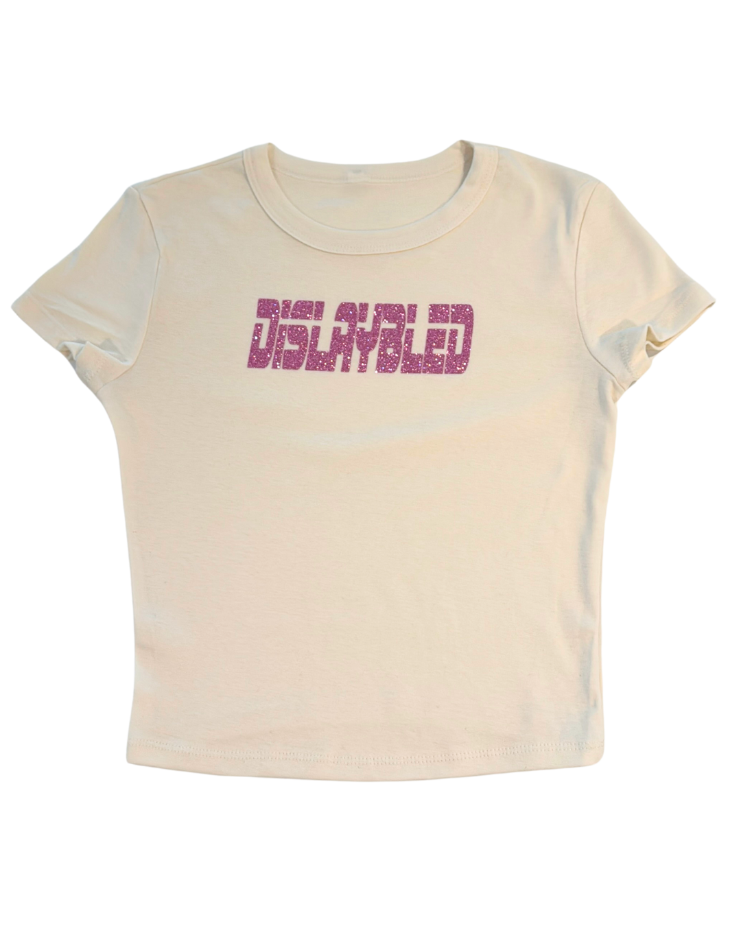 off-white t-shirt with "DISLAYBLED" pink glitter text on a white background