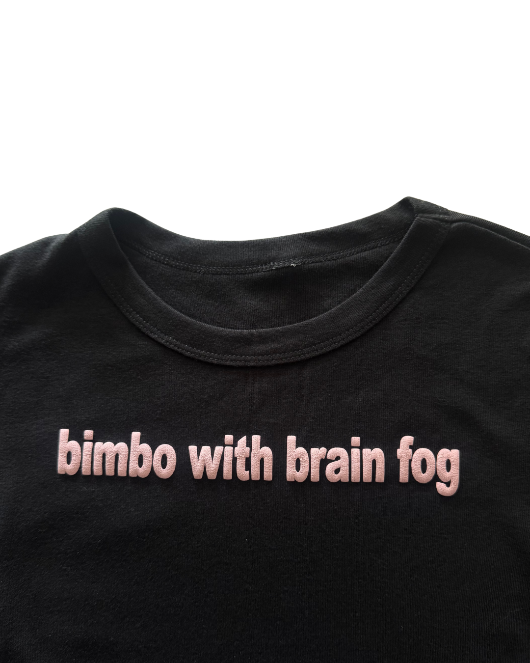 Black t-shirt with pink text 'bimbo with brain fog' on a white background