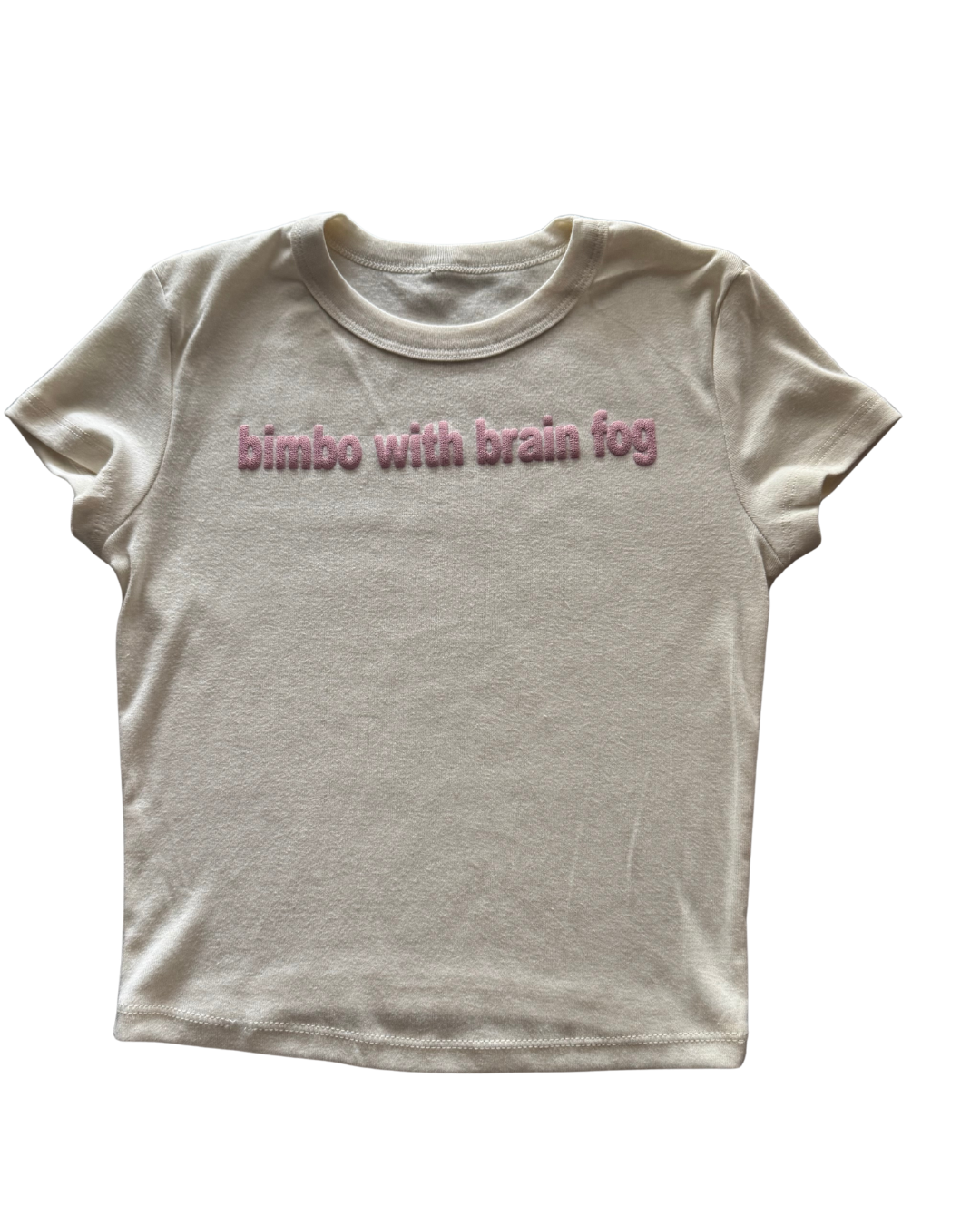 White t-shirt with pink text 'bimbo with brain fog' on a white background